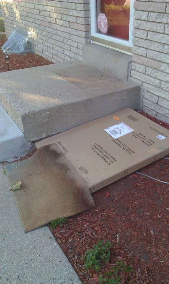 UPS trying to hide a package they delivered to my house