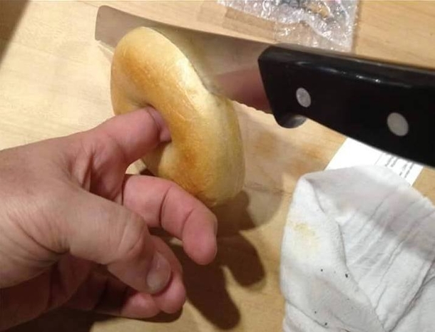 When cutting bagels in half put your finger trough the stabilization hole to keep it steady