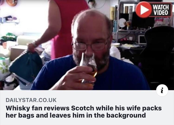 Whisky Fan Reviews Scotch While His Wife Packs Her Bags And Leaves Him In The Background