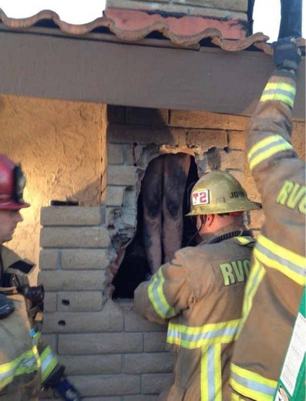 Woman tries getting into ex boyfriends house by sliding down chimney like Santa Claus didnt go as planned