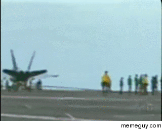 Yellow shirt on USS George Washington jumps a snapped arresting cable twice