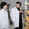 Pic #3 - Kim Jong Un looking at things
