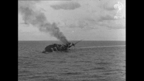 A British battleship explodes mid-capsize as a German torpedo salvo hits Huge gif