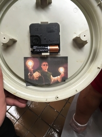 A co-worker posted pictures of himself in random places when he quit This is the back of a clock and he quit  years ago