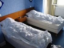 A few years ago a friend and I made false corpses with sheets before leaving our hotel