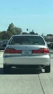 A funny license plate made even funnier by the fact the car was being driven by an -year-old woman