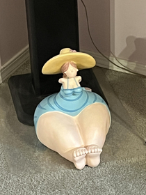 A thick armless little figurine