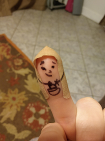 Band-aid finger puppet