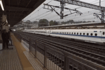 Bullet train passing at Odawara station Japan