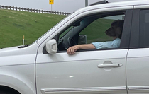 Business casual dog going for a drive