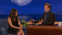 Conan tries to flirt with Mila Kunis