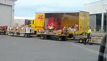 DHL carefully packing a truck