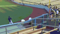Dodgers pitcher Hyun-Jin Ryu plays catch with little boy in stands during batting practice