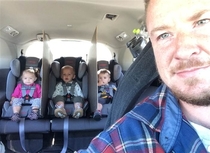 Driving was so peaceful Dad of triplets has genius fix for backseat battles