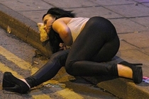 Drunk girl using pizza slice as a pillow