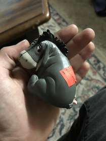 Eeyore is very displeased with the goodwill sticker