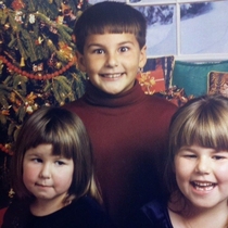 Favorite Xmas picture of me and my sisters Guess which one Id given a haircut to the day before