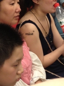 Finally an Asian with a random English word tattoo on them