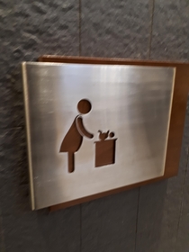 For a split second walking past this sign for a change station my brain thought is she throwing out a baby