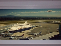 Found this photo hanging on the wall at an airport Had to do a double-take