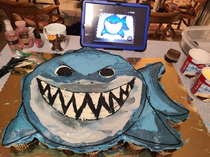 Friend of mine made a shark cake for her nephews first birthday I think she did a pretty spot on job