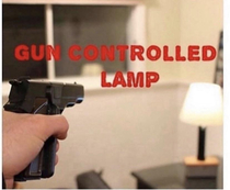 Gun controlled lamp