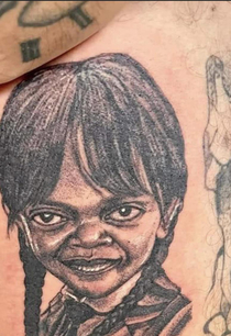 Guy got Wednesday tatted on him Looks more like Samuel L Jacksons daughter