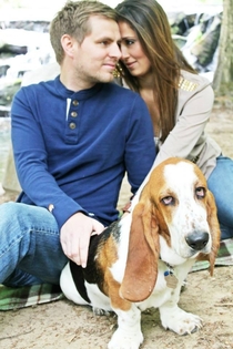 Happy couple upload over  wedding pictures to Facebook The dogs expression speaks for us all