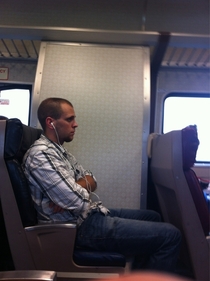 Hes been listening to Miley Cyrus for the past min not realizing that its so loud that the train car can hear it too
