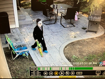 Husband just sent me this picture of our  year old sonHalloween fanatic from our backyard camera Basically a mix between Alex P Keaton and Jason Getting ready to terrorize all the neighborhood kids