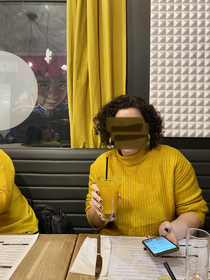 I guess mustard is a trendy color right now Went to a restaurant had matching color sweater with my friend the drapes and the drink 