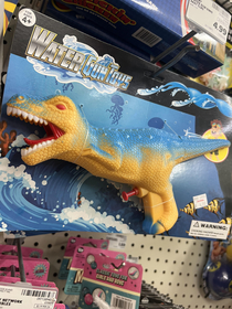 I saw this T-Rex squirt gun in the toy aisle of my local grocery store I bought it because of the trigger placement