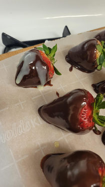 I tried to make milk chocolate covered strawberries with white chocolate drizzle on top but my white chocolate turned out a bit watery so now my test strawberry looks violated