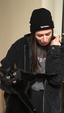 I tried to take a picture of my girlfriend holding my cat