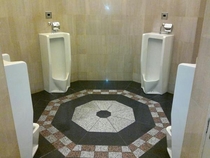 If four men pee at the same time in these urinals a path to a secret boss will open