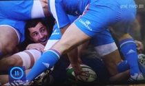 Irish Rugby player Rob Kearney builds a fort during the match against Italy