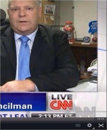Is that a bottle of vodka under Doug Fords desk during an interviewcouncil member of toronto and brother to Rob Ford