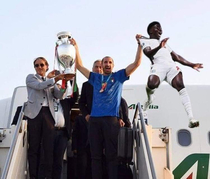 Italys team back to Rome D