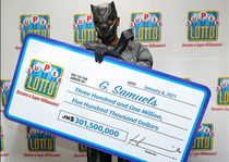 Jamaican lotto winner dresses as The Black Panther to hide his Identity RIP Chadwick Boseman 