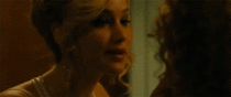Jennifer Lawrence kisses Amy Adams in American Hustle