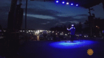 Jim Gaffigan performs stand-up comedy at a drive-in