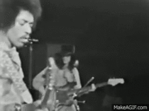 Jimi Hendrix tuning his guitar mid guitar solo