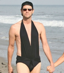 Just a Picture of Jim Carrey Staring Down a Paparazzi Photographer in His Girlfriends  Piece Bathing Suit