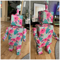 Just finished packing my besties birthday present Its able to stand on his own has the size of toddler and hint its not a robot