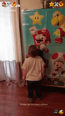 Kid is just way too excited about his Super Mario themed birthday party