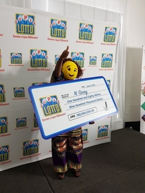 Lottery winner shows up in an emoji mask - its perfect