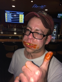 My brother after finishing a ghost pepper wings speed-eating challenge