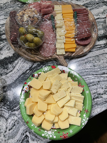 My cheese plate next to my moms I guess I need to up my game a bit Happy Holidays Everyone