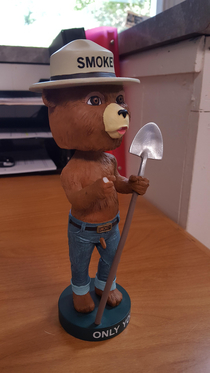 My co-worker broke the finger off of my Smokey bobblehead but we were able to fix it