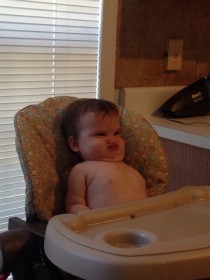 My daughter does this face when shes had enough to eat I think it has potential
